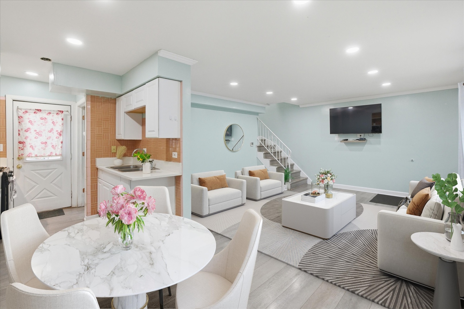 1582 Pennsylvania Avenue Des Plaines, IL 60018 - Photo 6 of 28 a living room with furniture and a flat screen tv