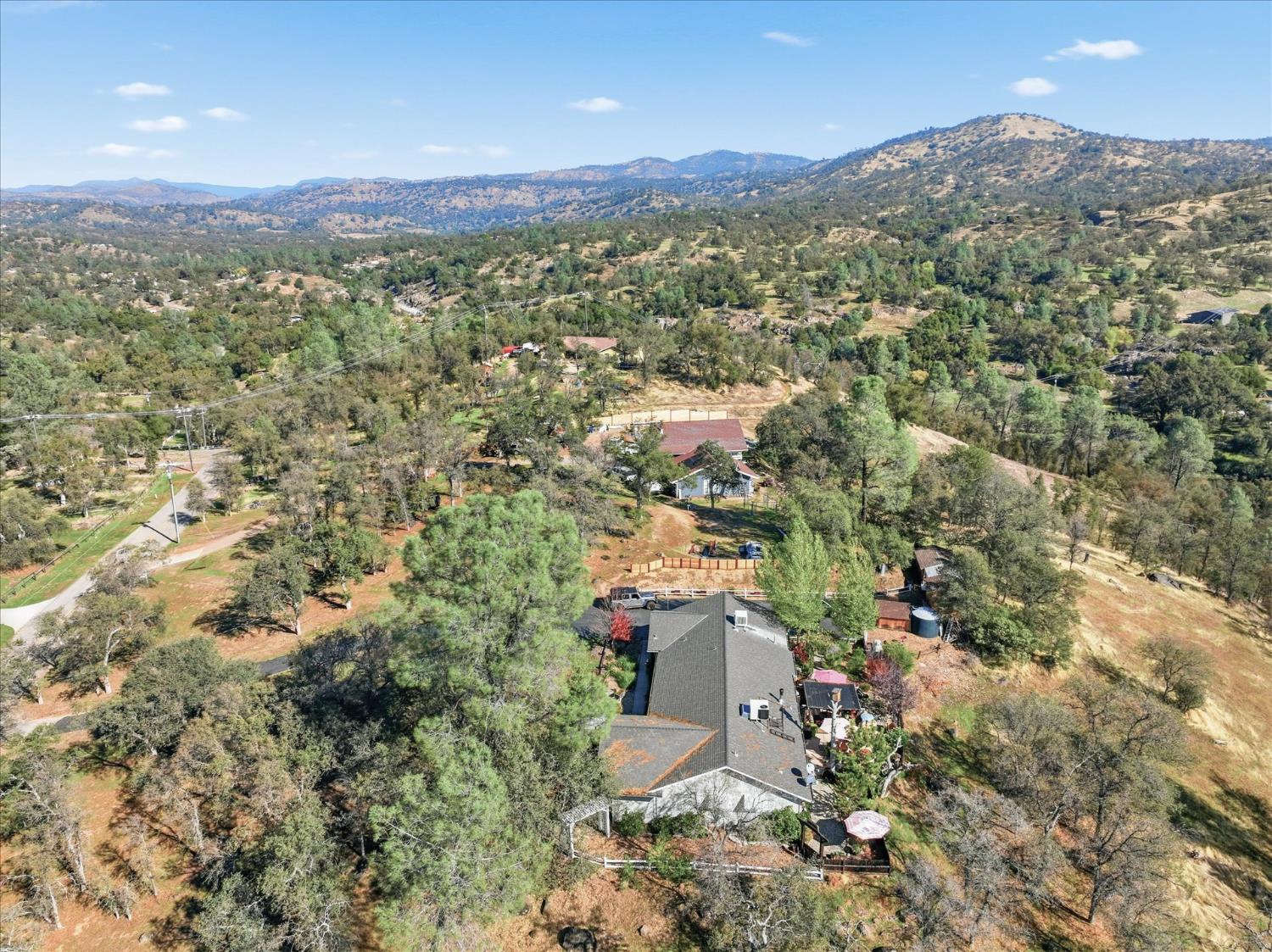 32583 River Knolls Road Coarsegold, CA 93614 - Photo 63 of 63 an aerial view of a house with a yard
