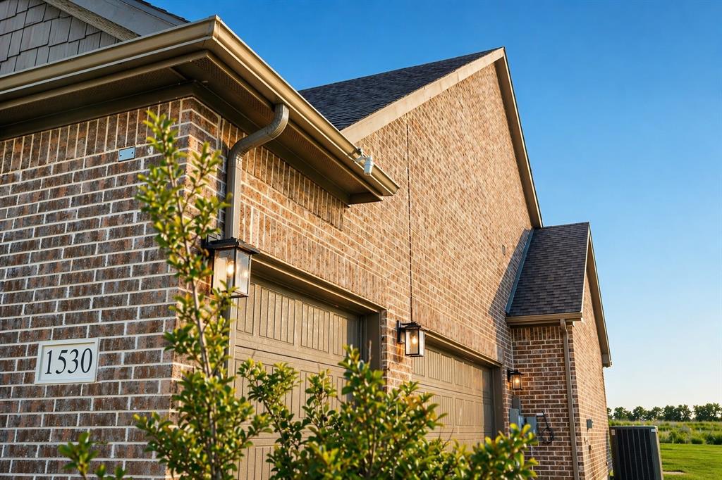 1530 County Road 200 Valley View, TX 76272 - Photo 3 of 34 Brick exterior with contrasting trim and architectural shingles