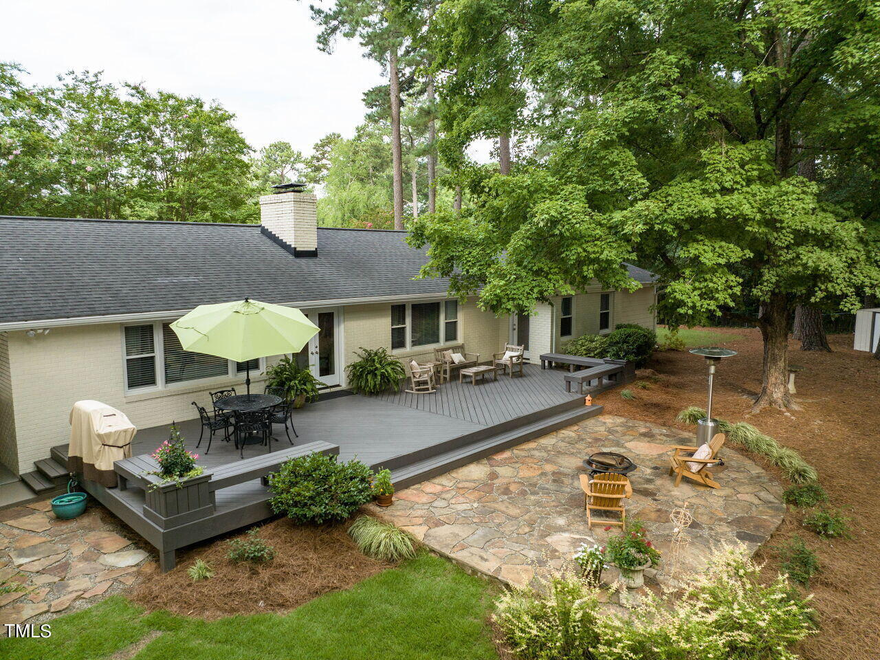 3510 Wordsworth Place Raleigh, NC 27609 - Photo 26 of 40 Back deck and stone patio