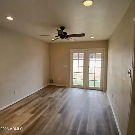 a view of an empty room with a window