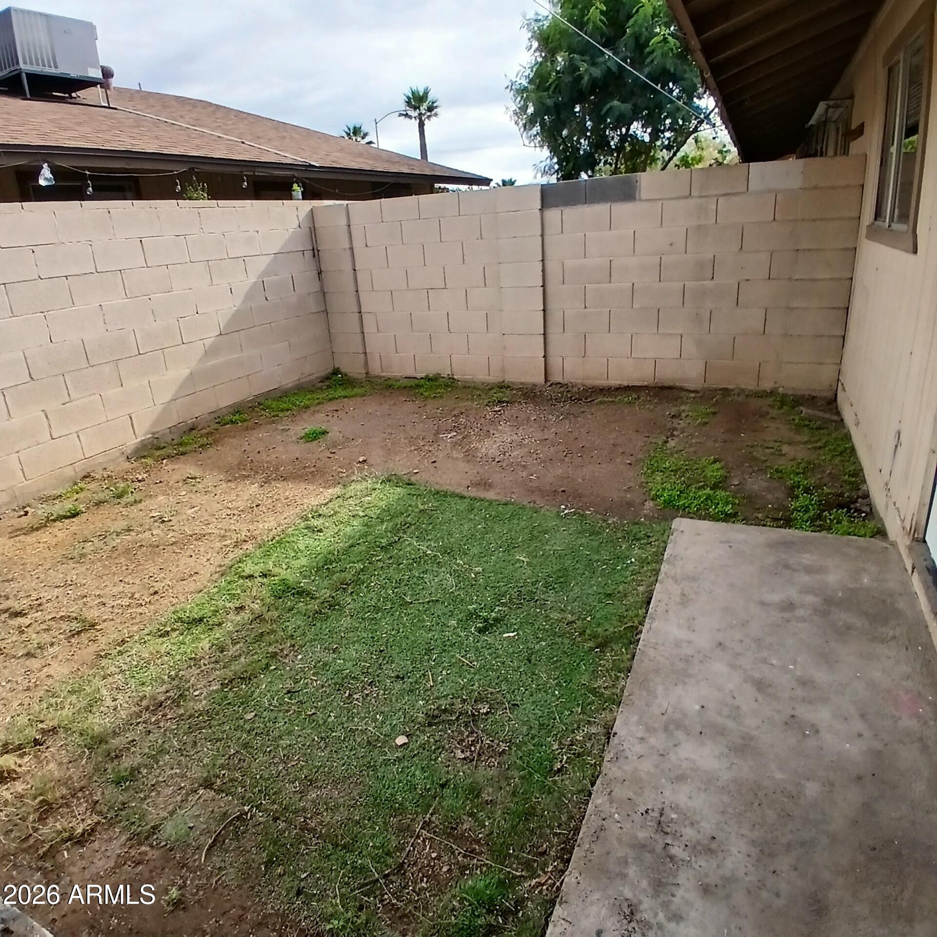 1216 West Purdue Avenue, Unit 3 Phoenix, AZ 85021 - Photo 14 of 14 a view of a backyard