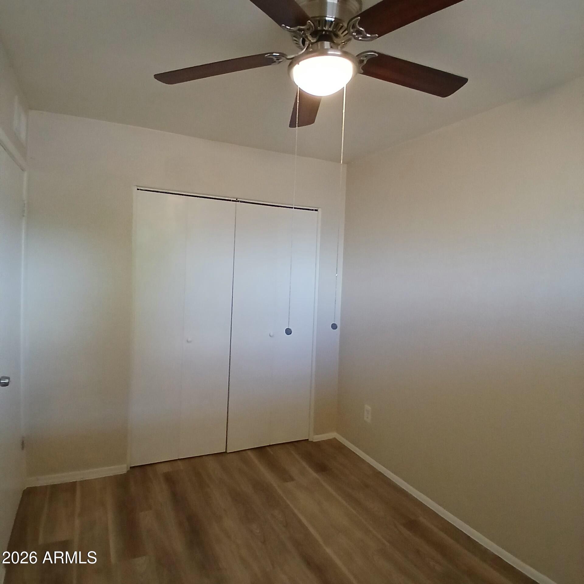 1216 West Purdue Avenue, Unit 3 Phoenix, AZ 85021 - Photo 10 of 14 a view of an empty room