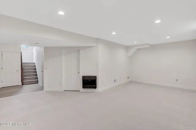 an empty room with a bathroom