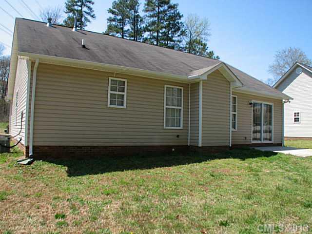 13423 Phillips Road Matthews, NC 28105 - Photo 11 of 11 a view of a house with a yard
