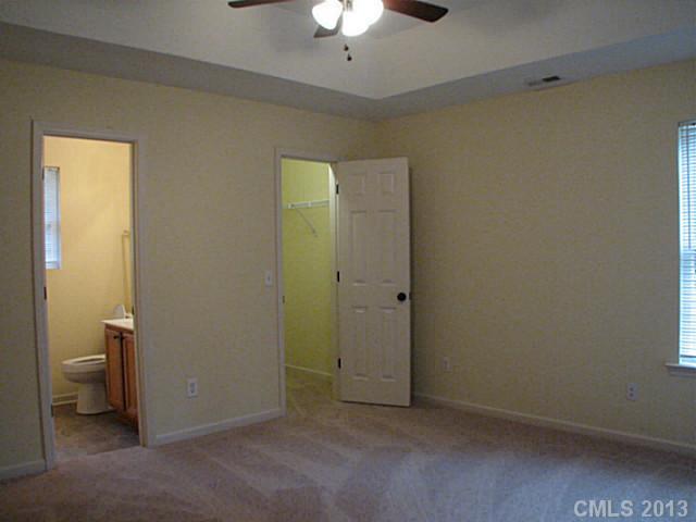 13423 Phillips Road Matthews, NC 28105 - Photo 6 of 11 a view of a bathroom with a sink and a toilet