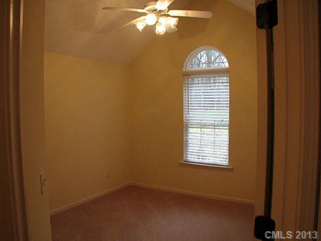 13423 Phillips Road Matthews, NC 28105 - Photo 7 of 11 an empty room with a window