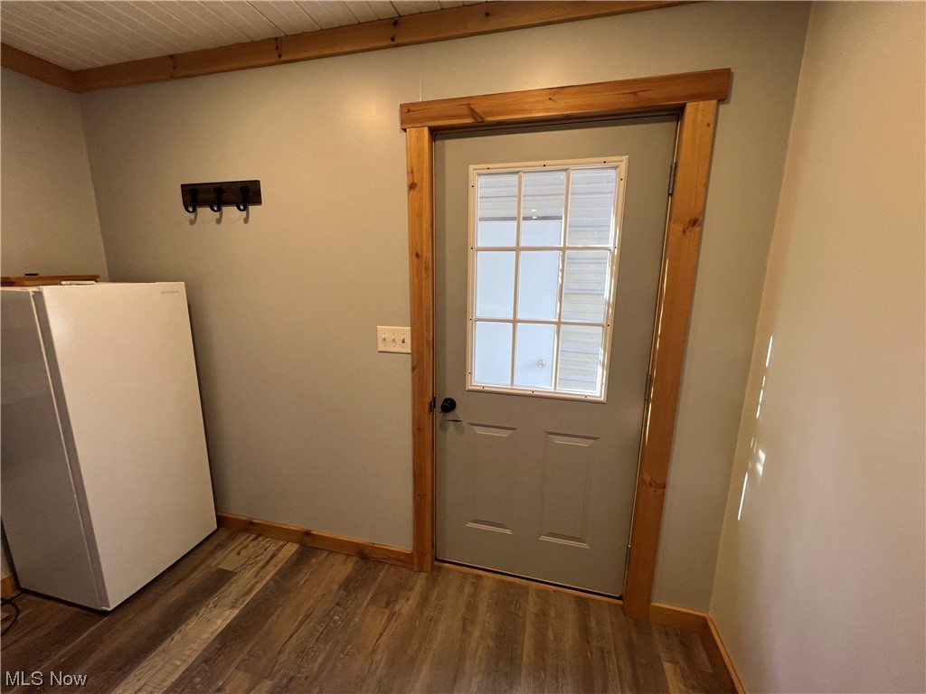 6544 Middle Run Road Dover, OH 44622 - Photo 22 of 47 Doorway to outside with dark wood-type flooring