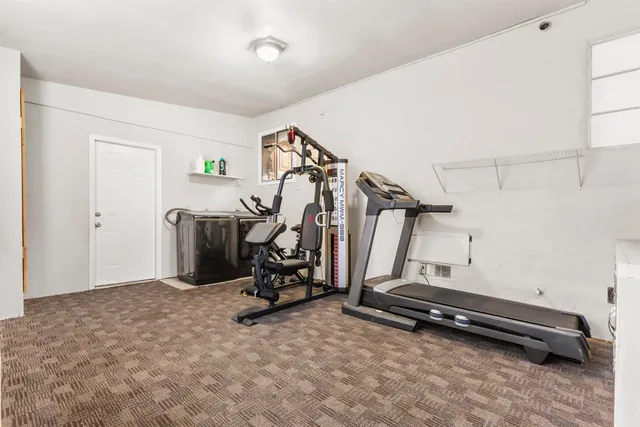 a view of a room with gym equipment