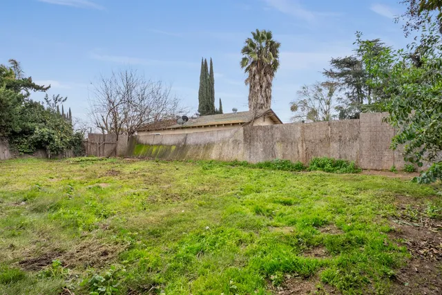 a view of swimming pool with a garden
