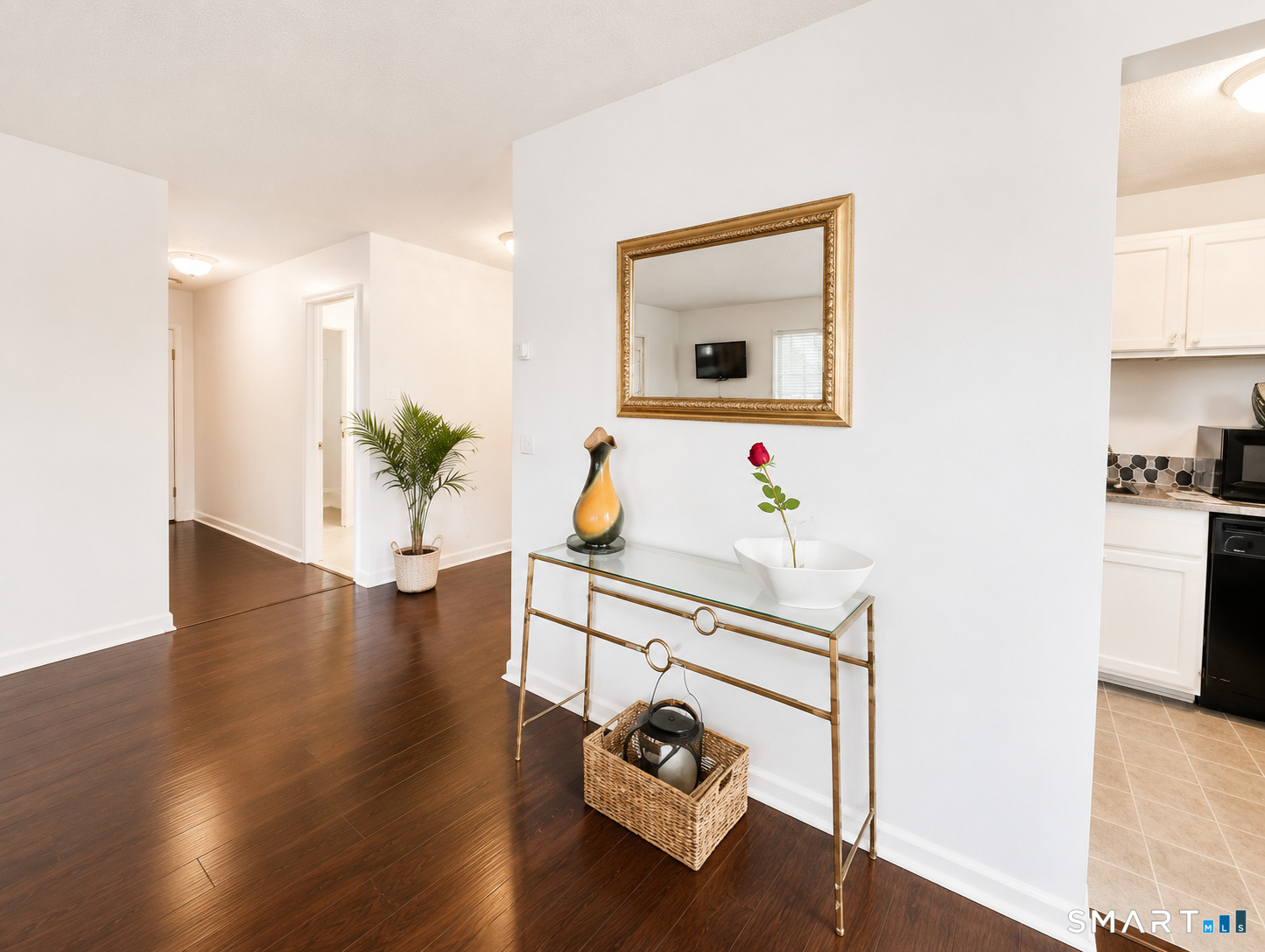 914 High Path Road, Unit 914 Windsor, CT 06095 - Photo 9 of 23 a living room with furniture and wooden floor