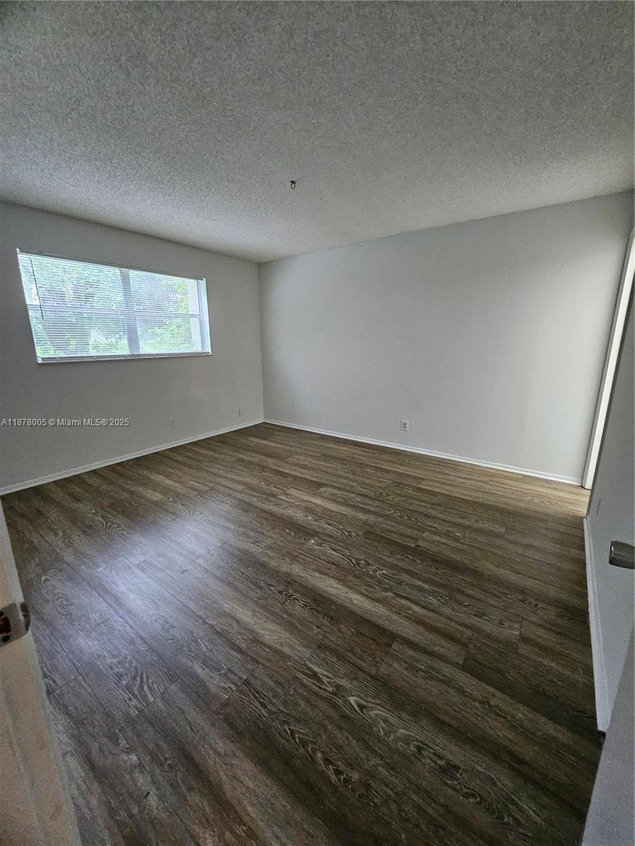 7820 South Colony Circle, Unit 102 Tamarac, FL 33321 - Photo 23 of 51 Master Bedroom