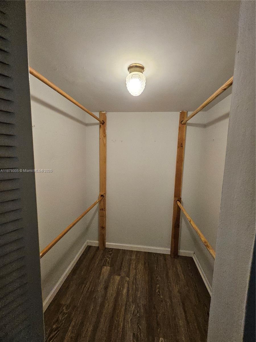 7820 South Colony Circle, Unit 102 Tamarac, FL 33321 - Photo 28 of 51 Master Bedroom Walk-in closet