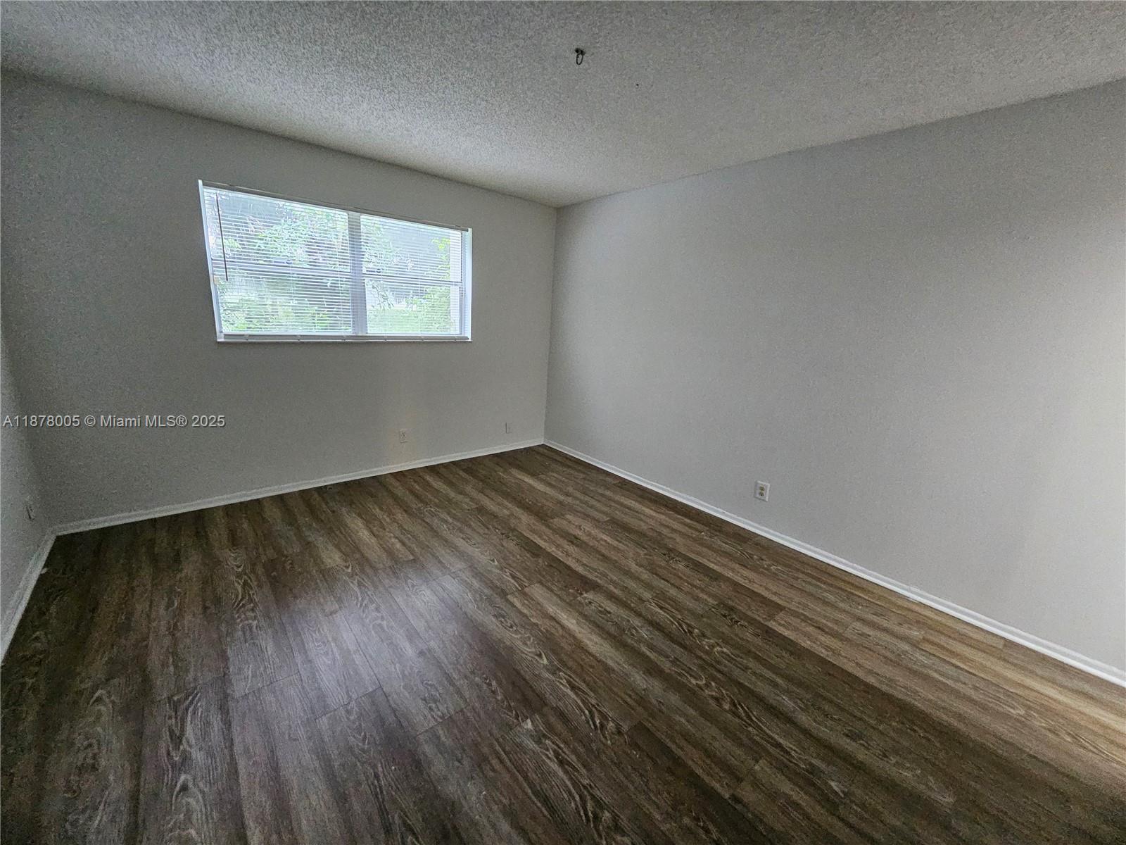 7820 South Colony Circle, Unit 102 Tamarac, FL 33321 - Photo 29 of 51 Master Bedroom