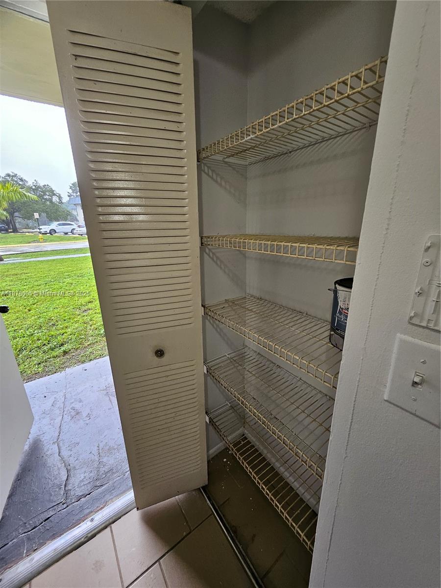 7820 South Colony Circle, Unit 102 Tamarac, FL 33321 - Photo 3 of 51 large closet at the entrance
