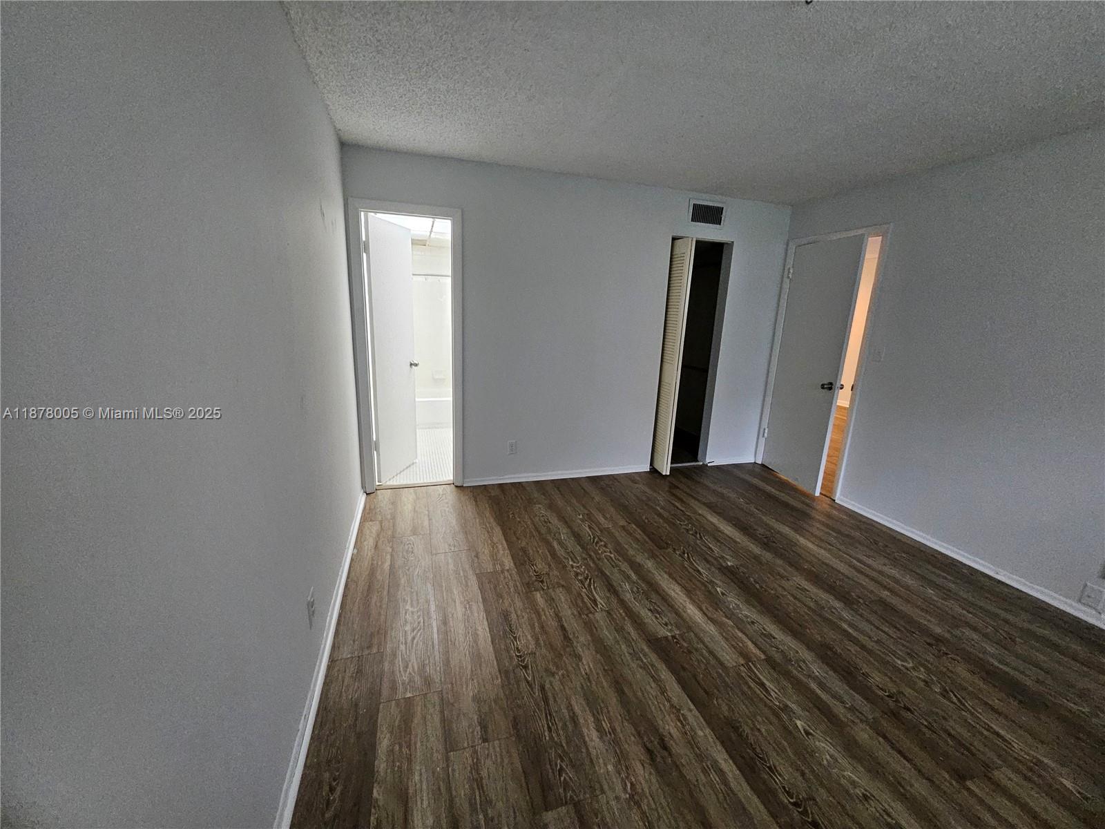 7820 South Colony Circle, Unit 102 Tamarac, FL 33321 - Photo 31 of 51 Master Bedroom