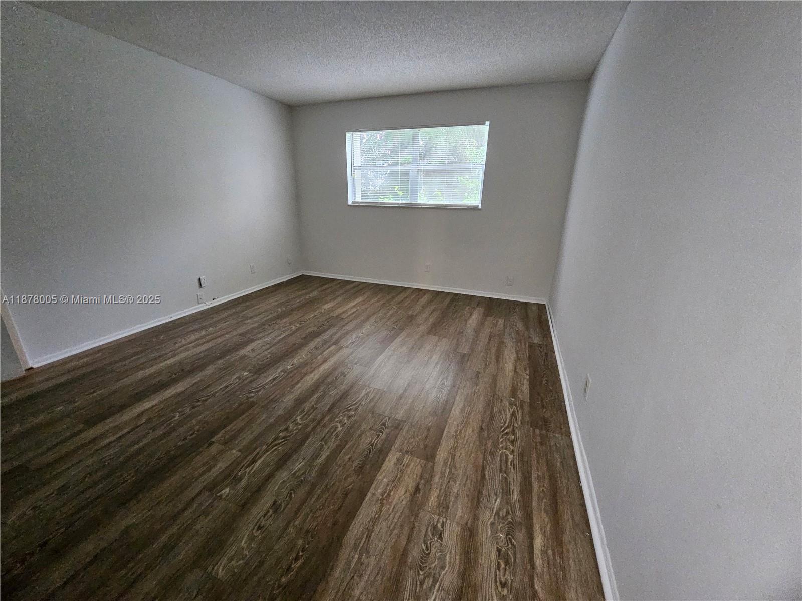 7820 South Colony Circle, Unit 102 Tamarac, FL 33321 - Photo 32 of 51 Master Bedroom