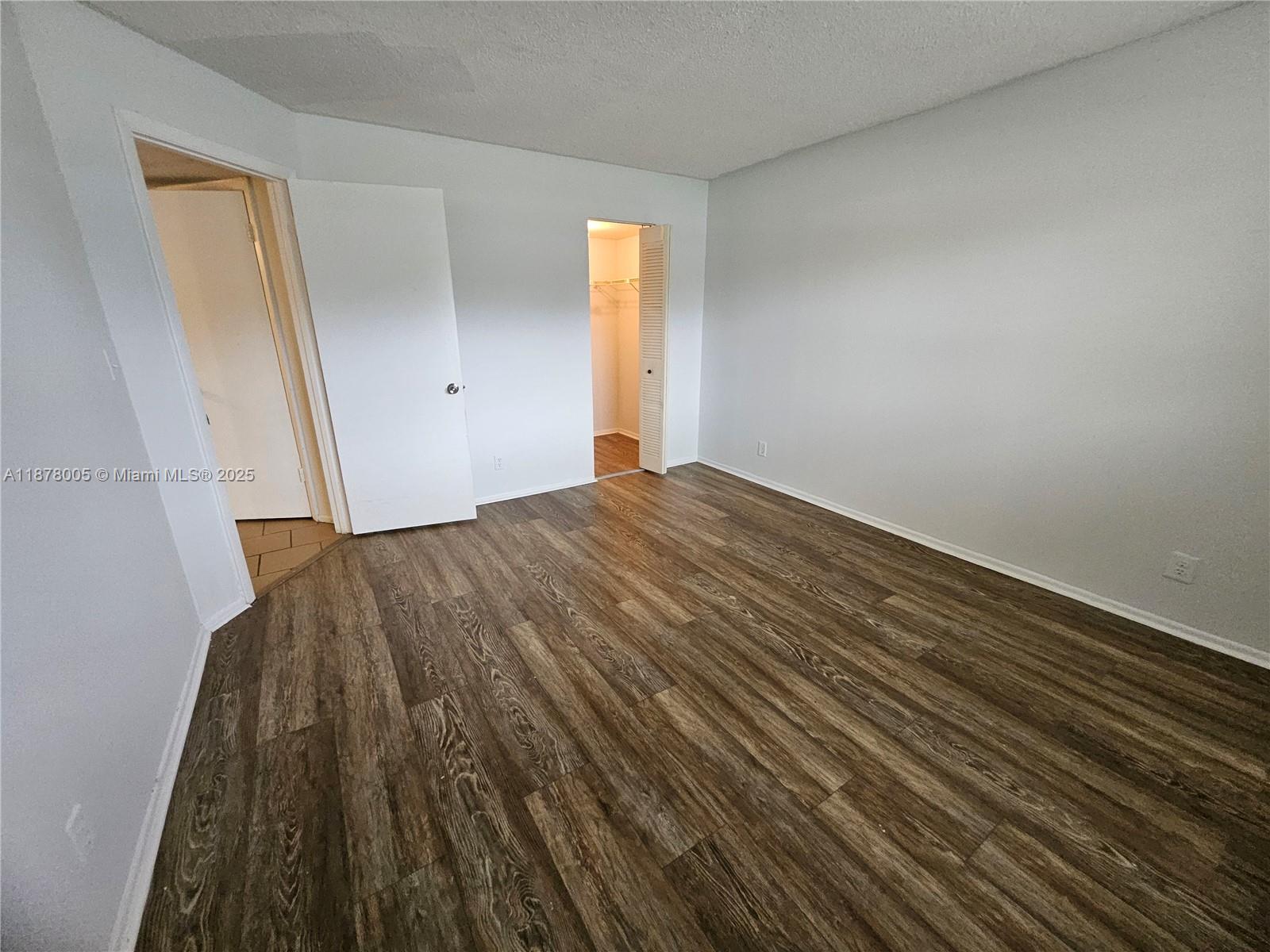 7820 South Colony Circle, Unit 102 Tamarac, FL 33321 - Photo 40 of 51 Guest Bedroom