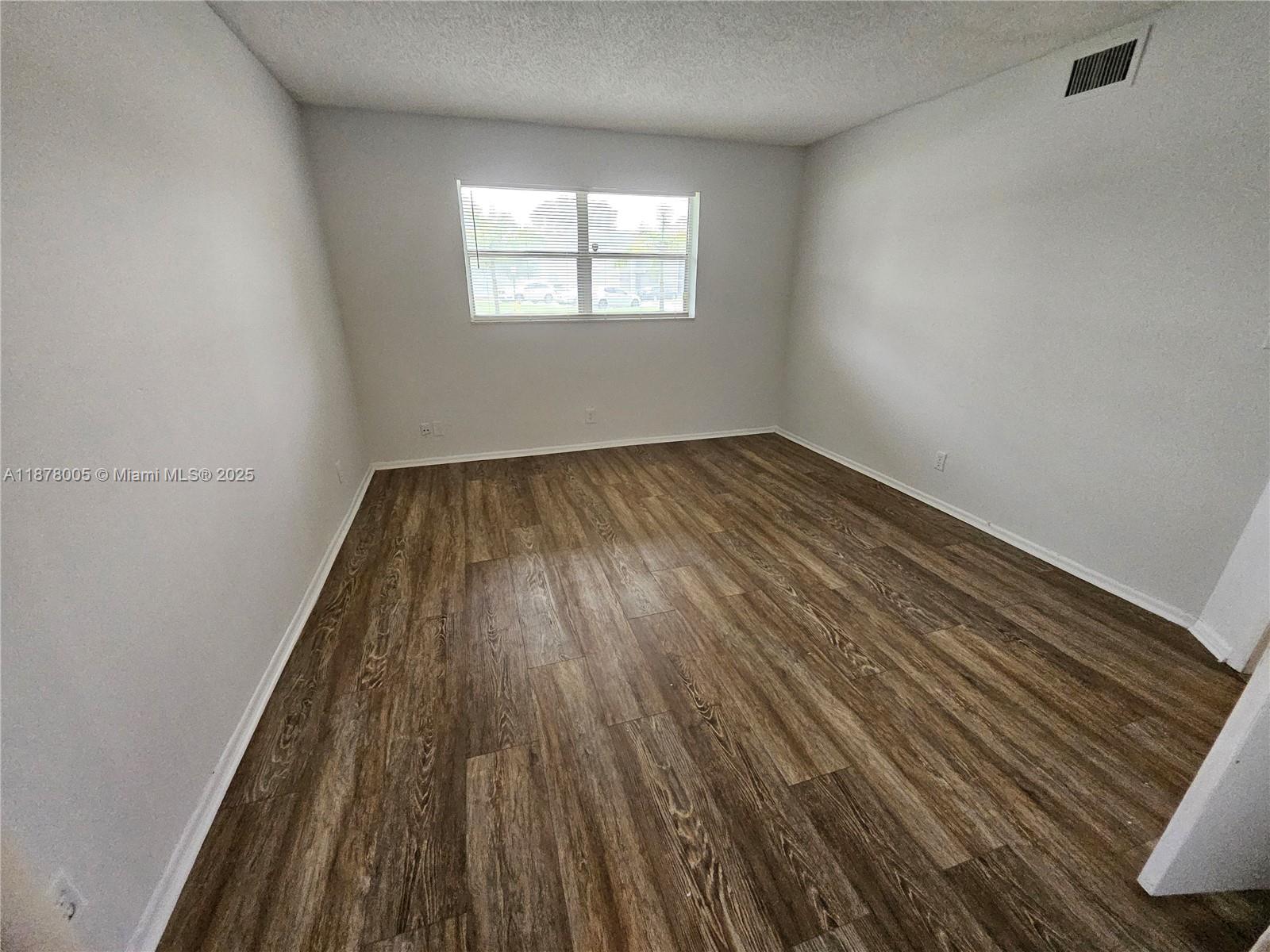 7820 South Colony Circle, Unit 102 Tamarac, FL 33321 - Photo 42 of 51 Guest Bedroom