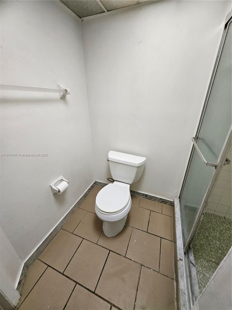 7820 South Colony Circle, Unit 102 Tamarac, FL 33321 - Photo 49 of 51 Guest Bathroom