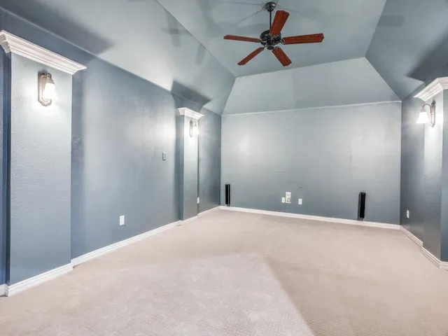 a view of a big room with carpet