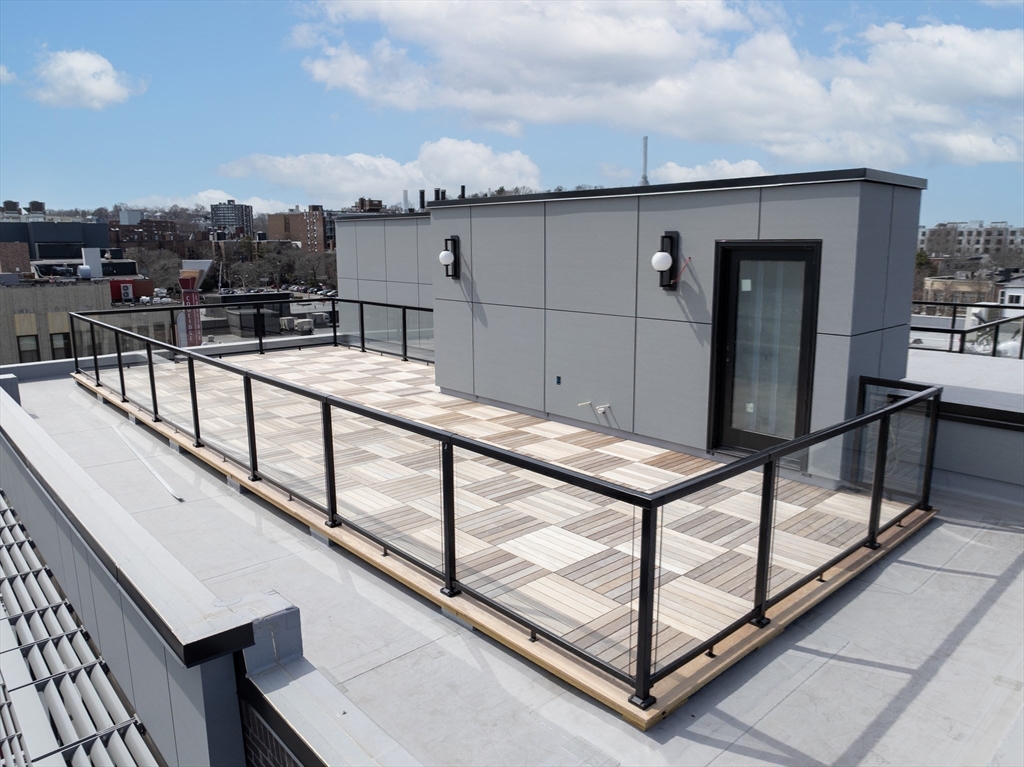 14 Green Street, Unit PH2 Brookline, MA 02446 - Photo 14 of 37 a view of a balcony