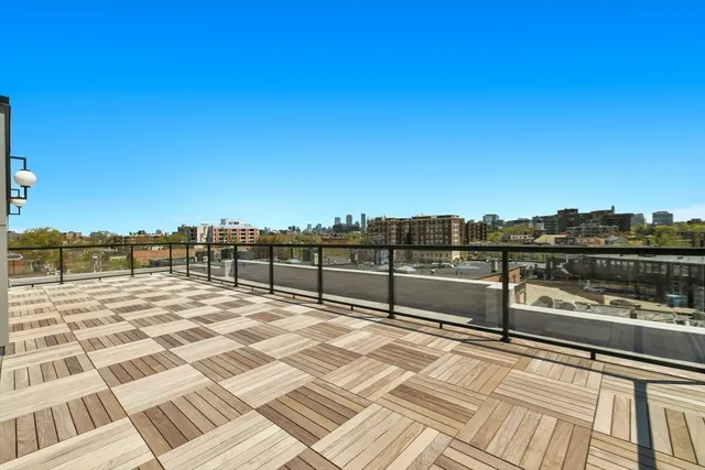 a view of a city with tall buildings