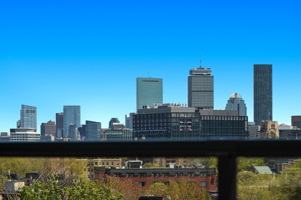 14 Green Street, Unit PH2 Brookline, MA 02446 - Photo 17 of 37 a view of a city with tall buildings