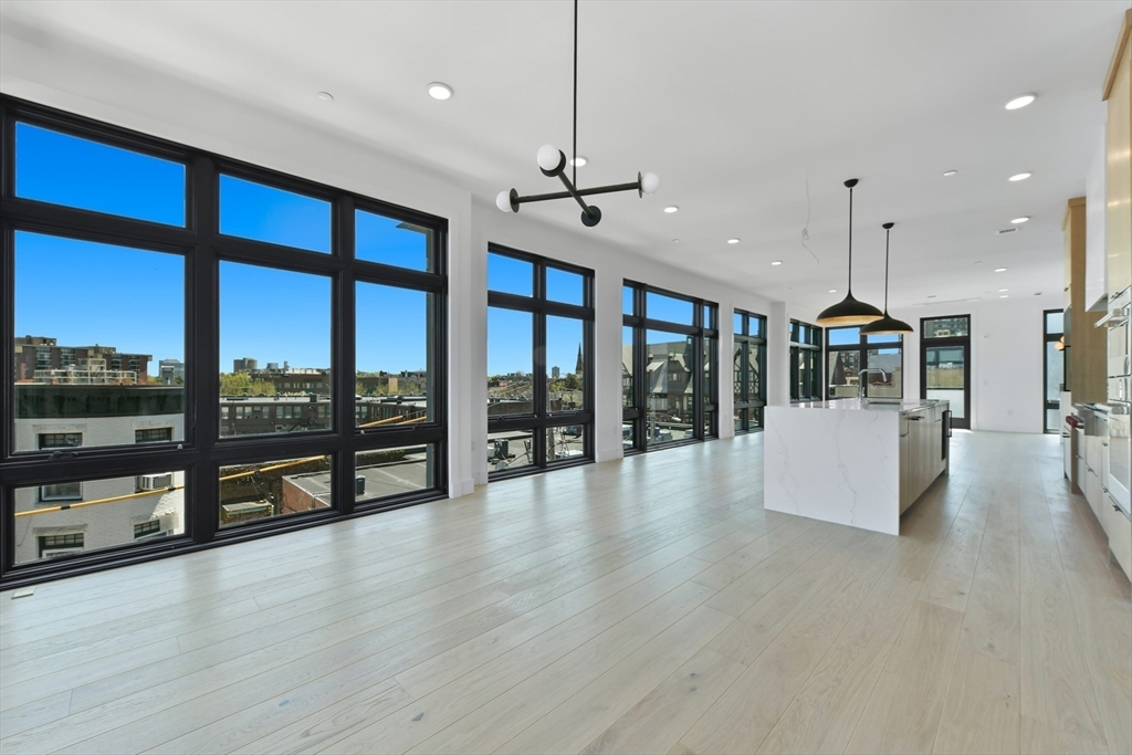 14 Green Street, Unit PH2 Brookline, MA 02446 - Photo 3 of 37 a view of an entryway with wooden floor