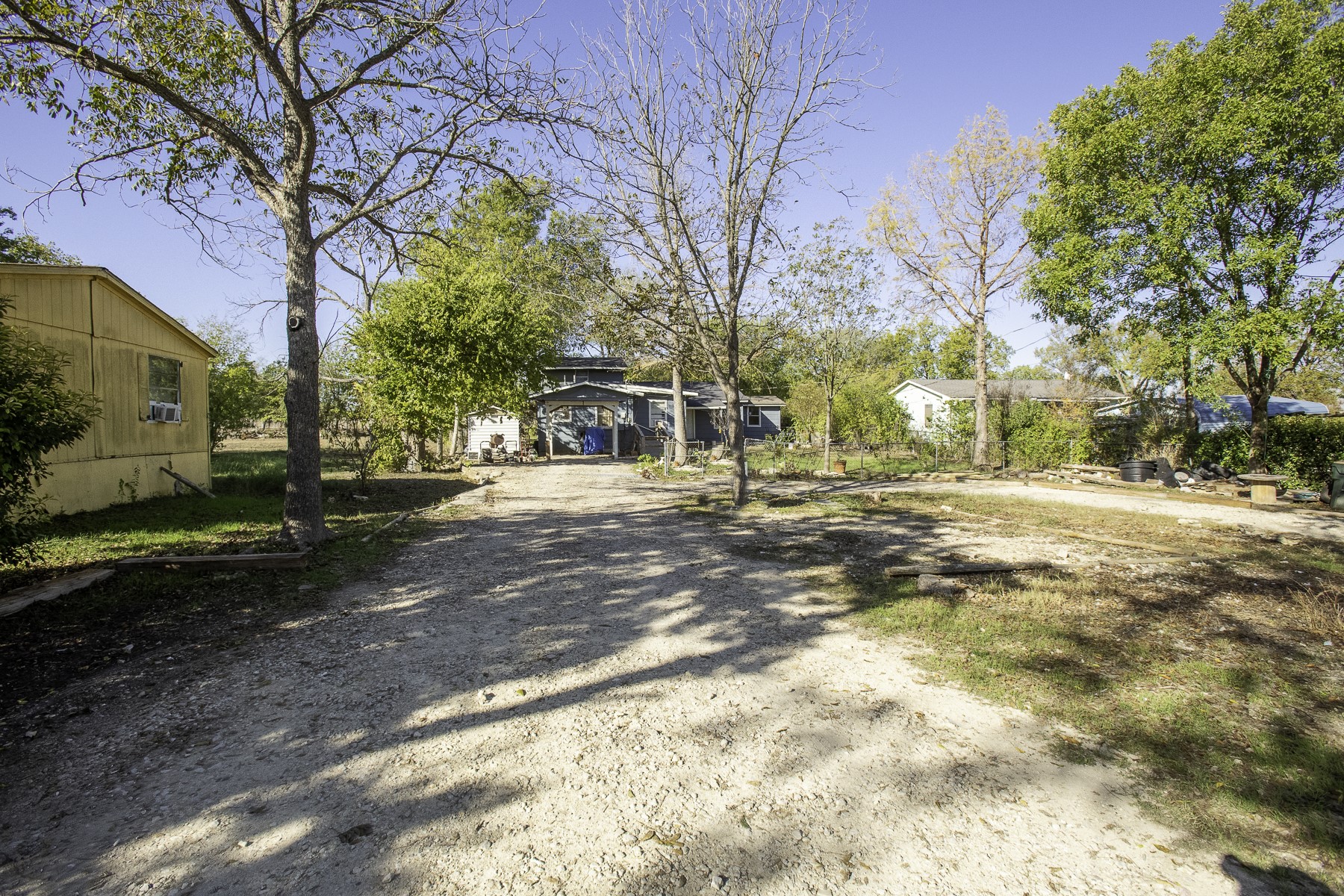 162 Mendoza Lane Buda, TX 78610 - Photo 1 of 19 a view of city street with residential houses