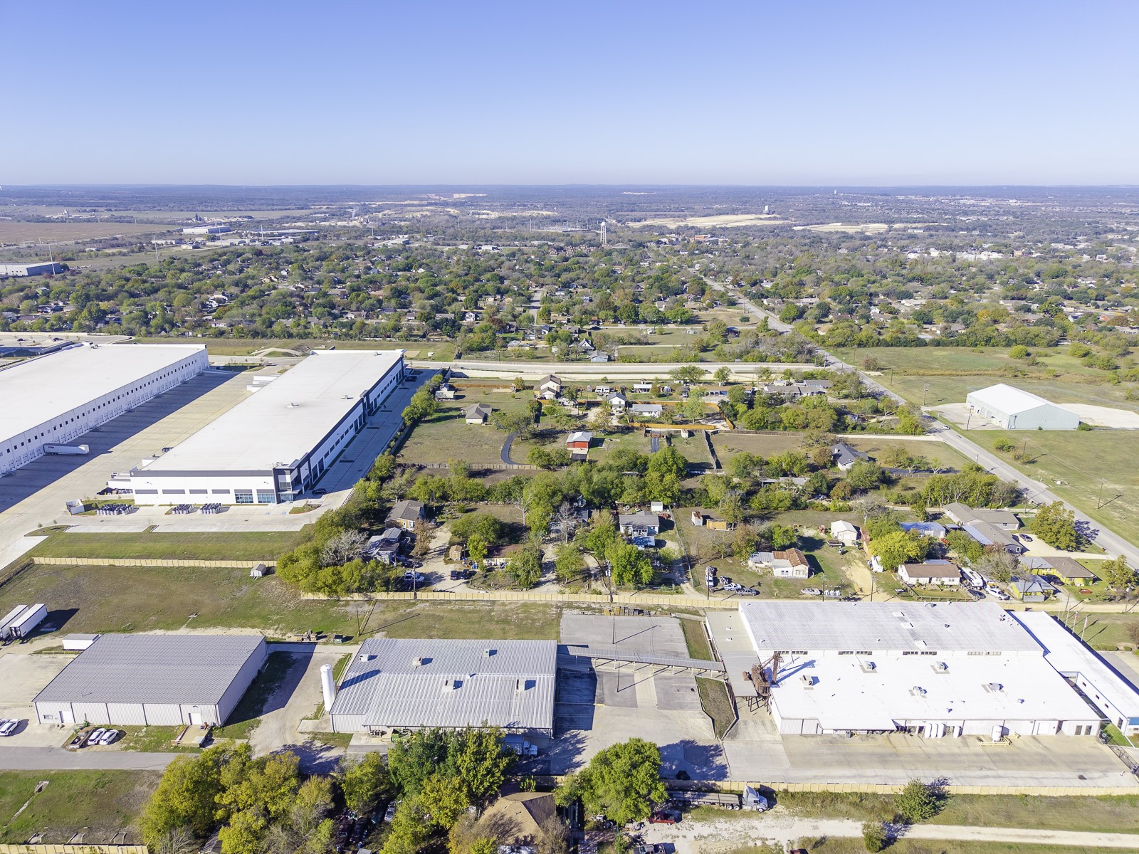 162 Mendoza Lane Buda, TX 78610 - Photo 15 of 19 an aerial view of residential building and lake view