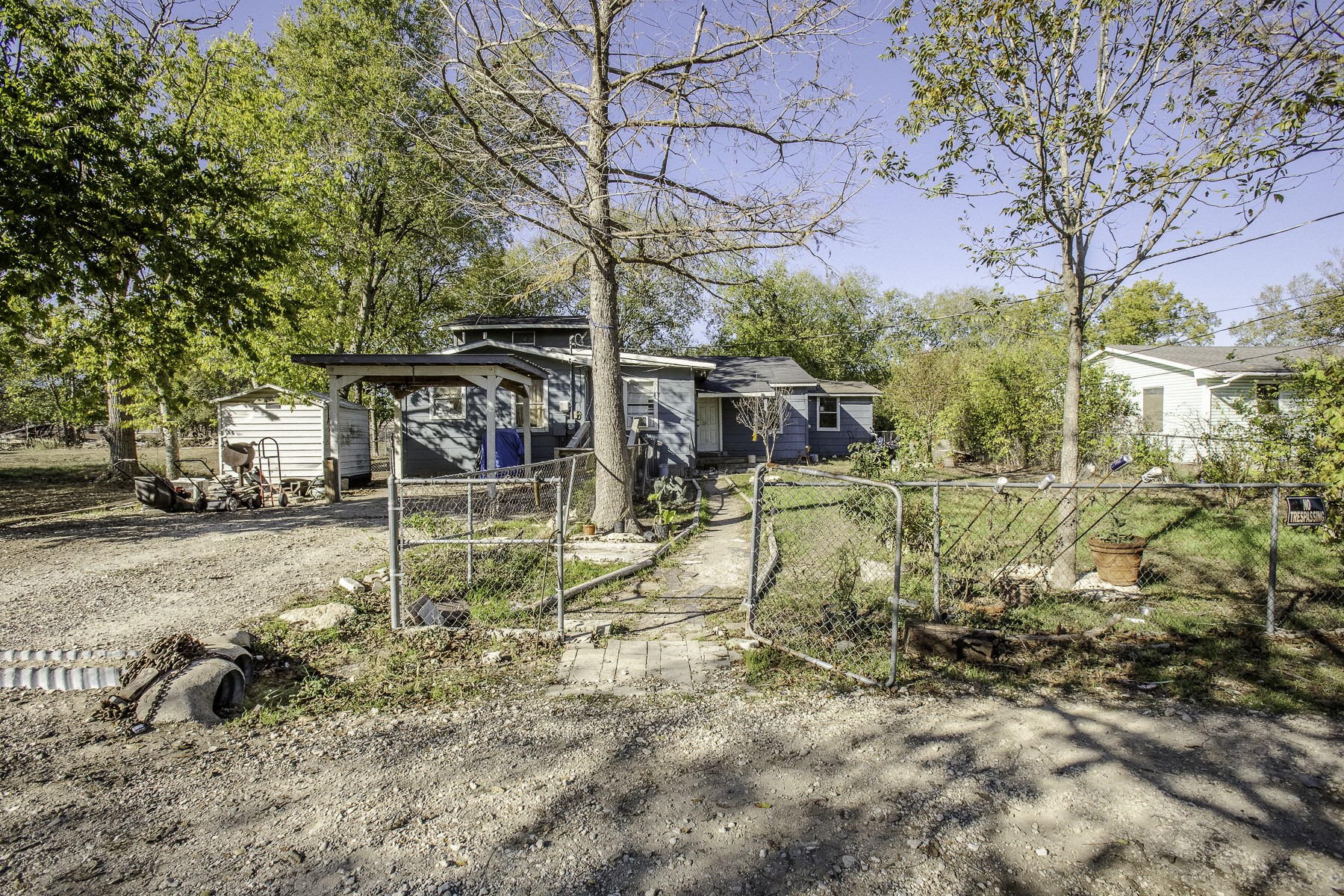 162 Mendoza Lane Buda, TX 78610 - Photo 2 of 19 a view of a yard with wooden fence
