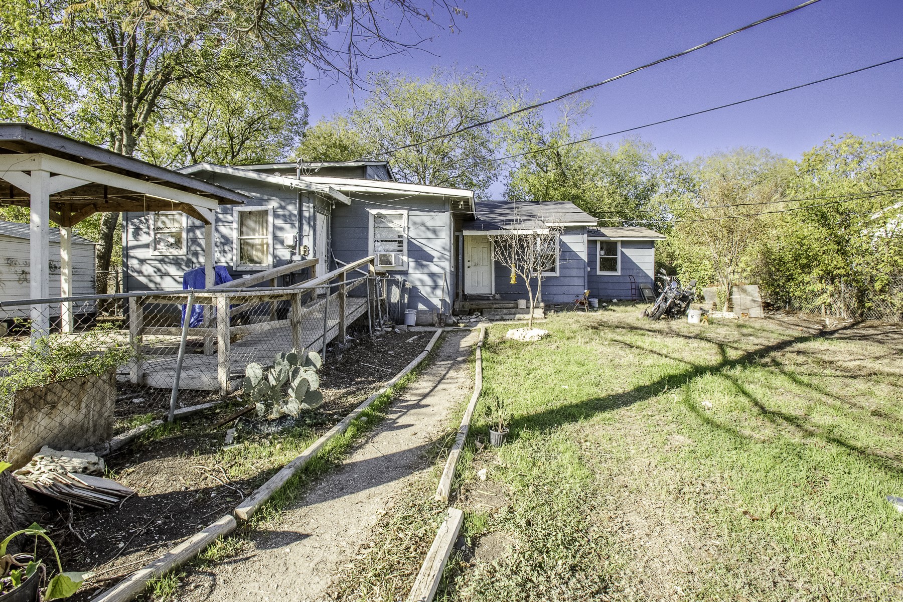 162 Mendoza Lane Buda, TX 78610 - Photo 6 of 19 a view of a house with backyard and balcony
