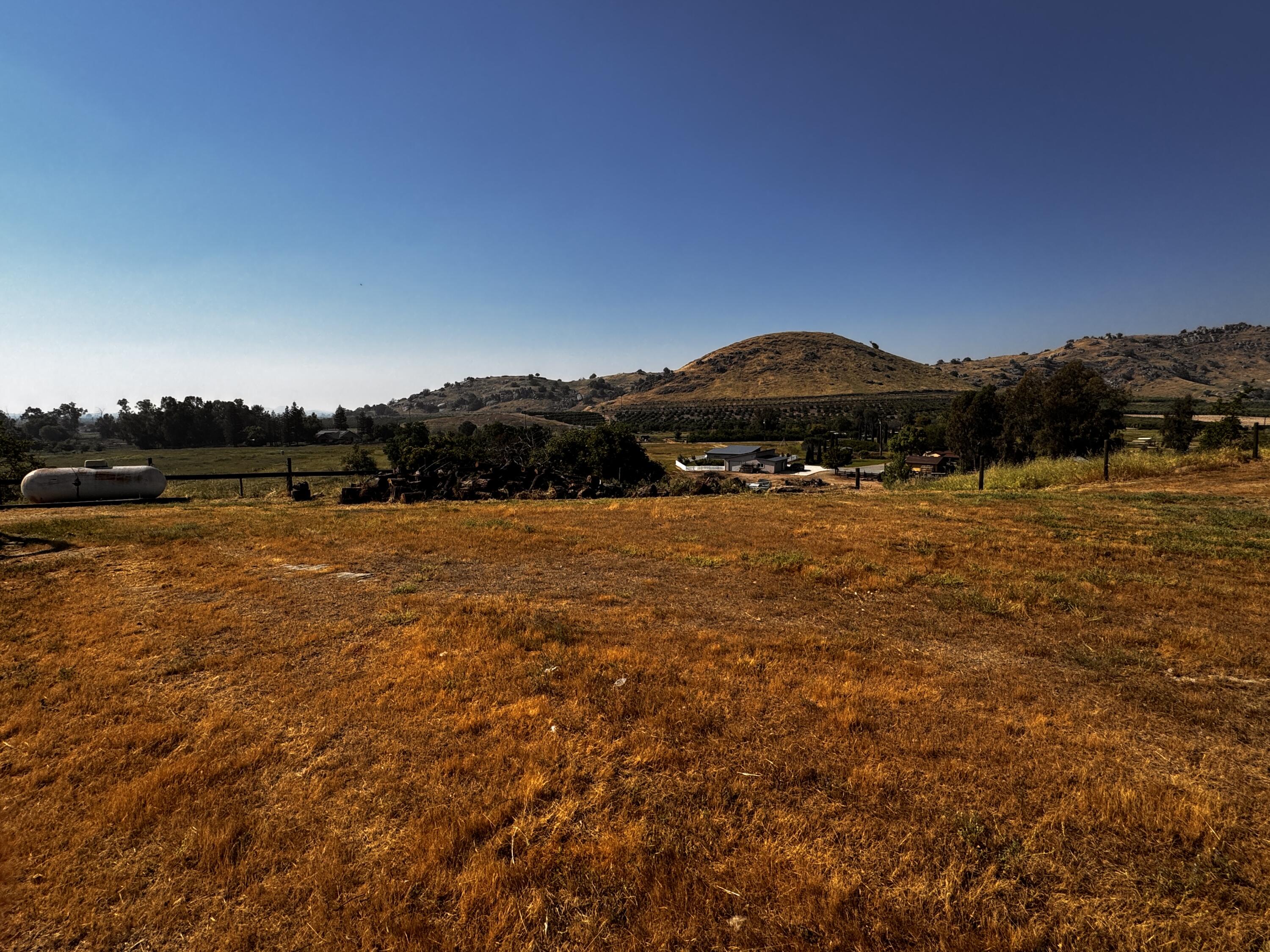 30723 Hamilton Drive Exeter, CA 93221 - Photo 57 of 85 a view of a lake with houses in the back