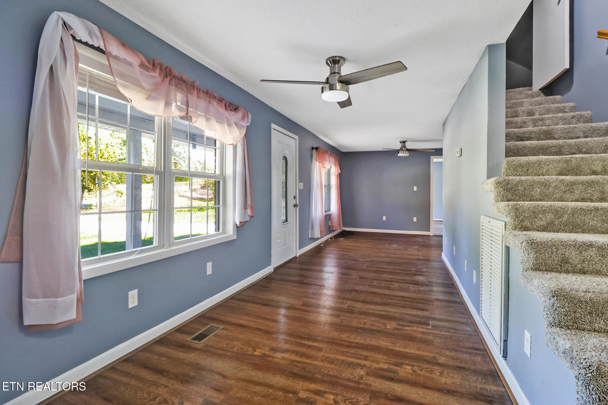 1271 Gouldstown Road Jamestown, TN 38556 - Photo 14 of 52 a view of an entryway with wooden floor and staircase