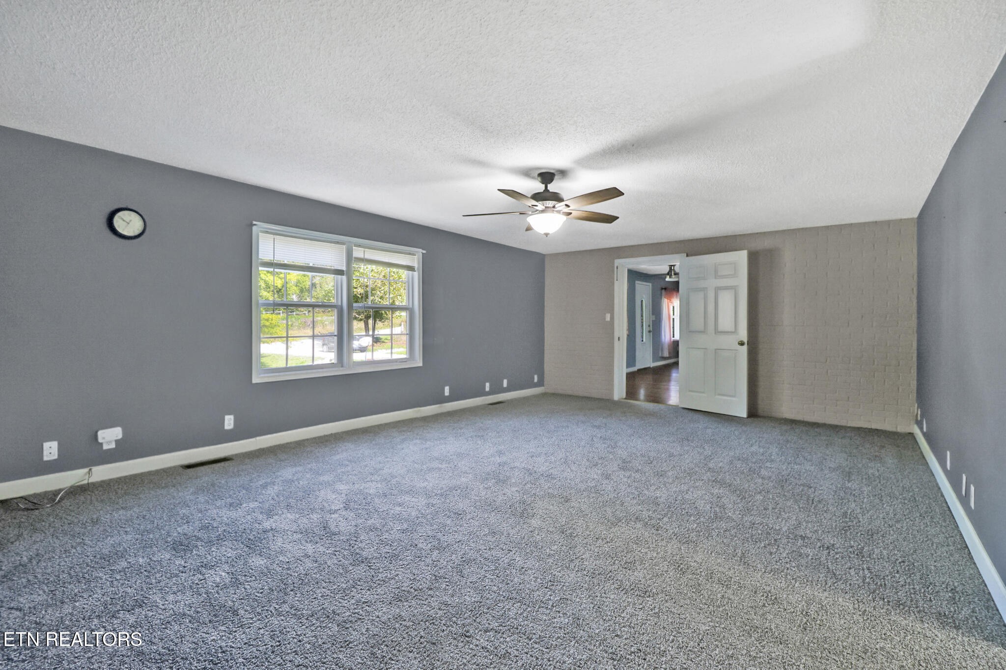 1271 Gouldstown Road Jamestown, TN 38556 - Photo 18 of 52 a view of an empty room with a window