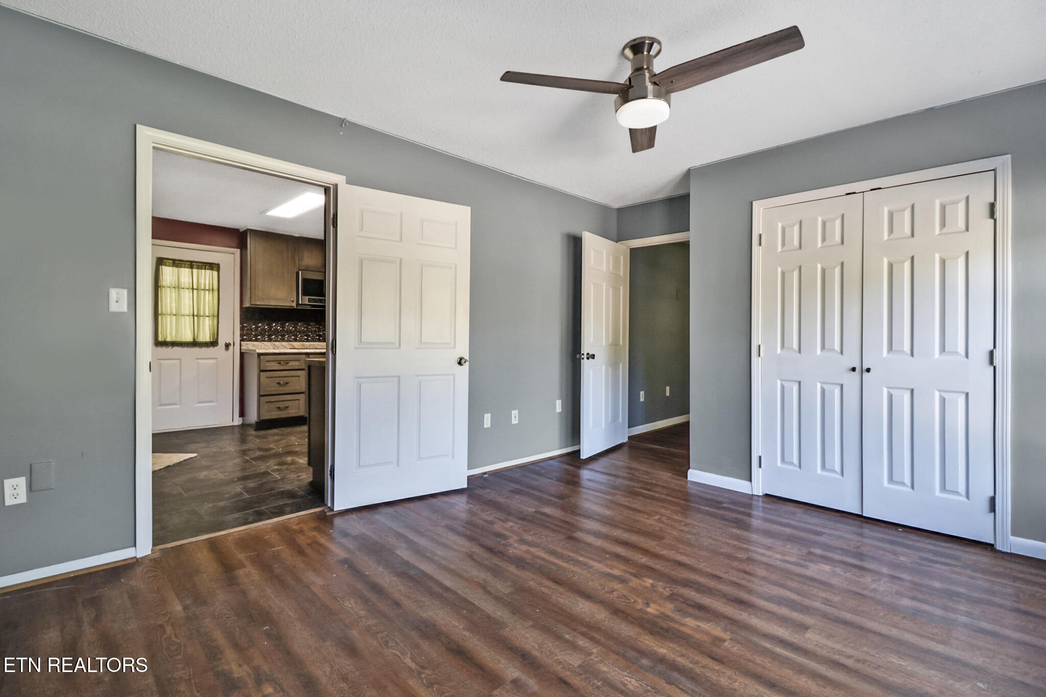 1271 Gouldstown Road Jamestown, TN 38556 - Photo 30 of 52 wooden floor in an empty room with a window