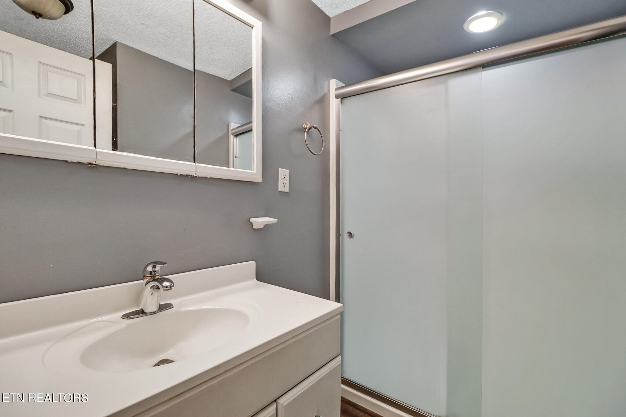 1271 Gouldstown Road Jamestown, TN 38556 - Photo 37 of 52 a bathroom with a sink and a mirror