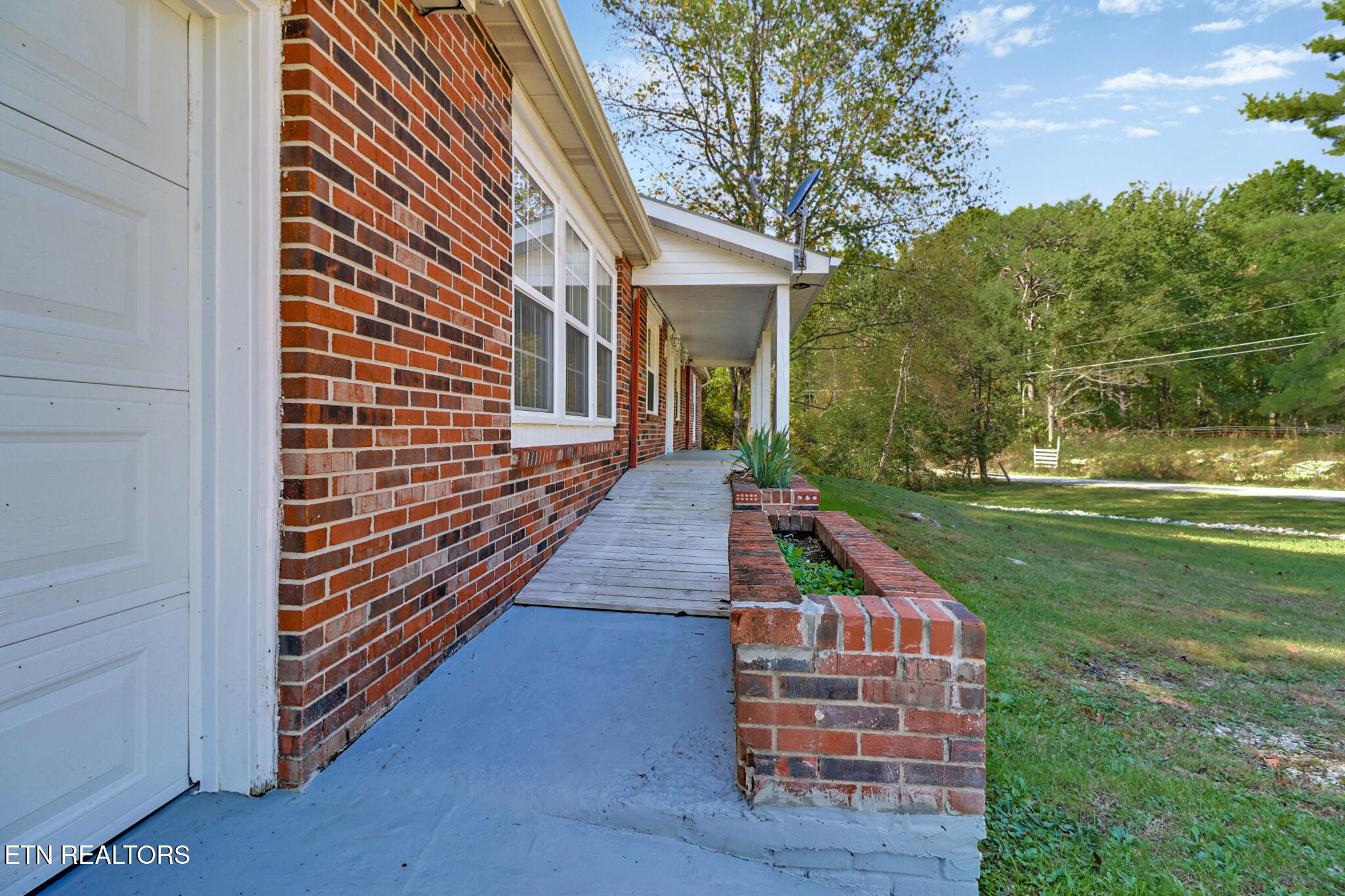 1271 Gouldstown Road Jamestown, TN 38556 - Photo 43 of 52 a view of a house with a yard