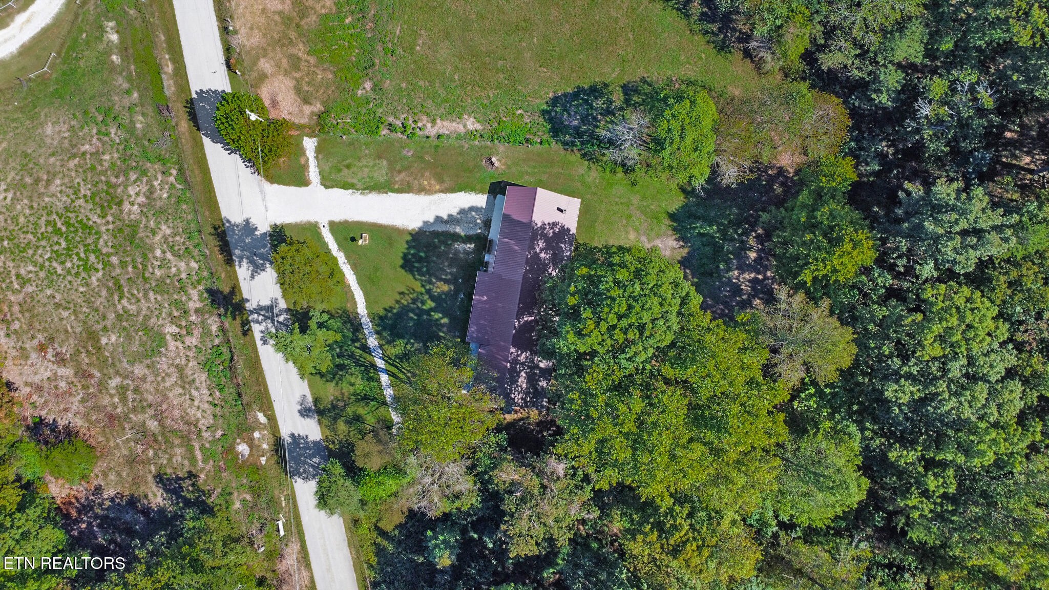 1271 Gouldstown Road Jamestown, TN 38556 - Photo 48 of 52 an aerial view of a house with a yard