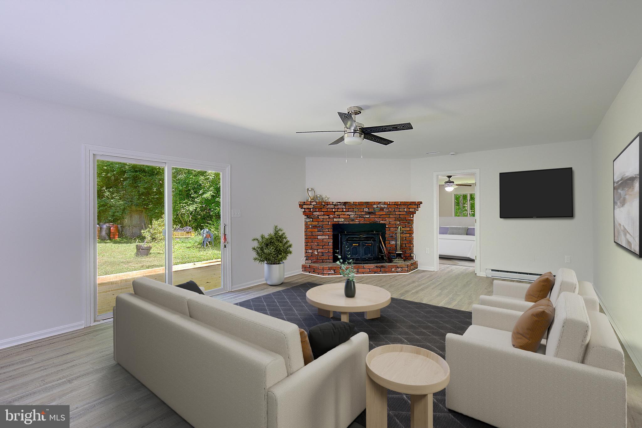 6664 Old Solomons Island Road Friendship, MD 20758 - Photo 1 of 40 Wood burning stove !Living room!