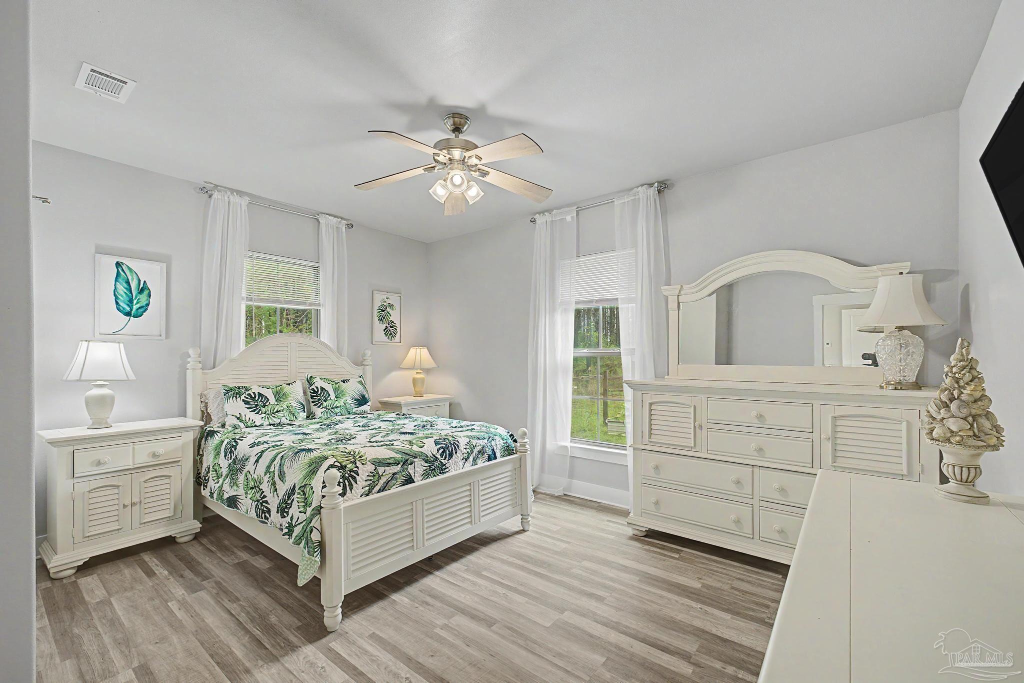 1918 Pineview Church Road Jay, FL 32565 - Photo 21 of 45 a living room with a bed furniture and a window