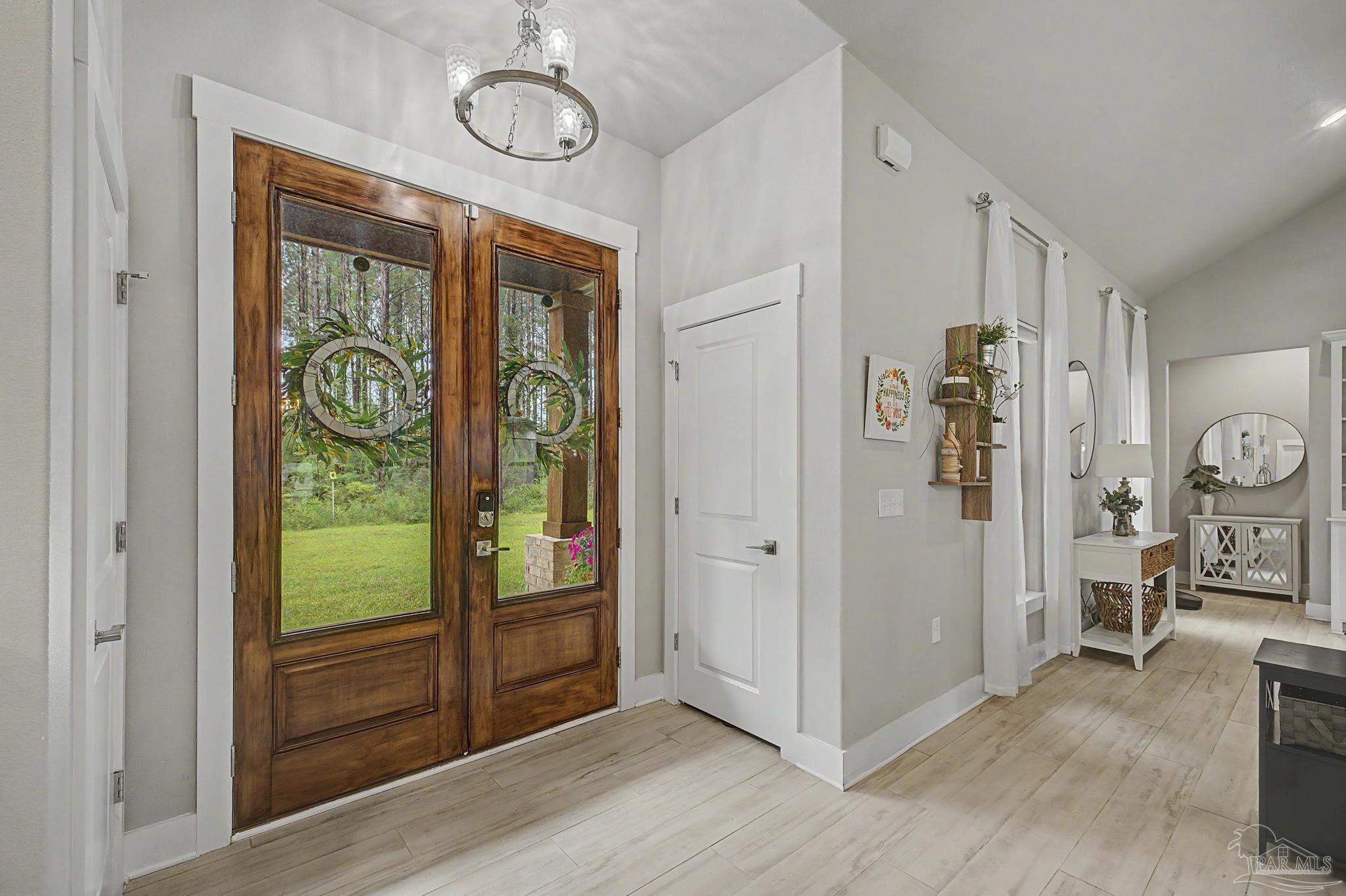 1918 Pineview Church Road Jay, FL 32565 - Photo 4 of 45 a view of an entryway with wooden floor
