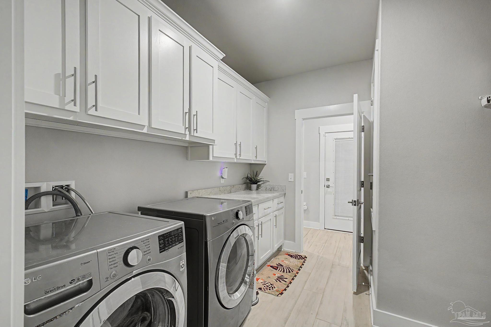 1918 Pineview Church Road Jay, FL 32565 - Photo 44 of 45 a utility room with dryer and washer