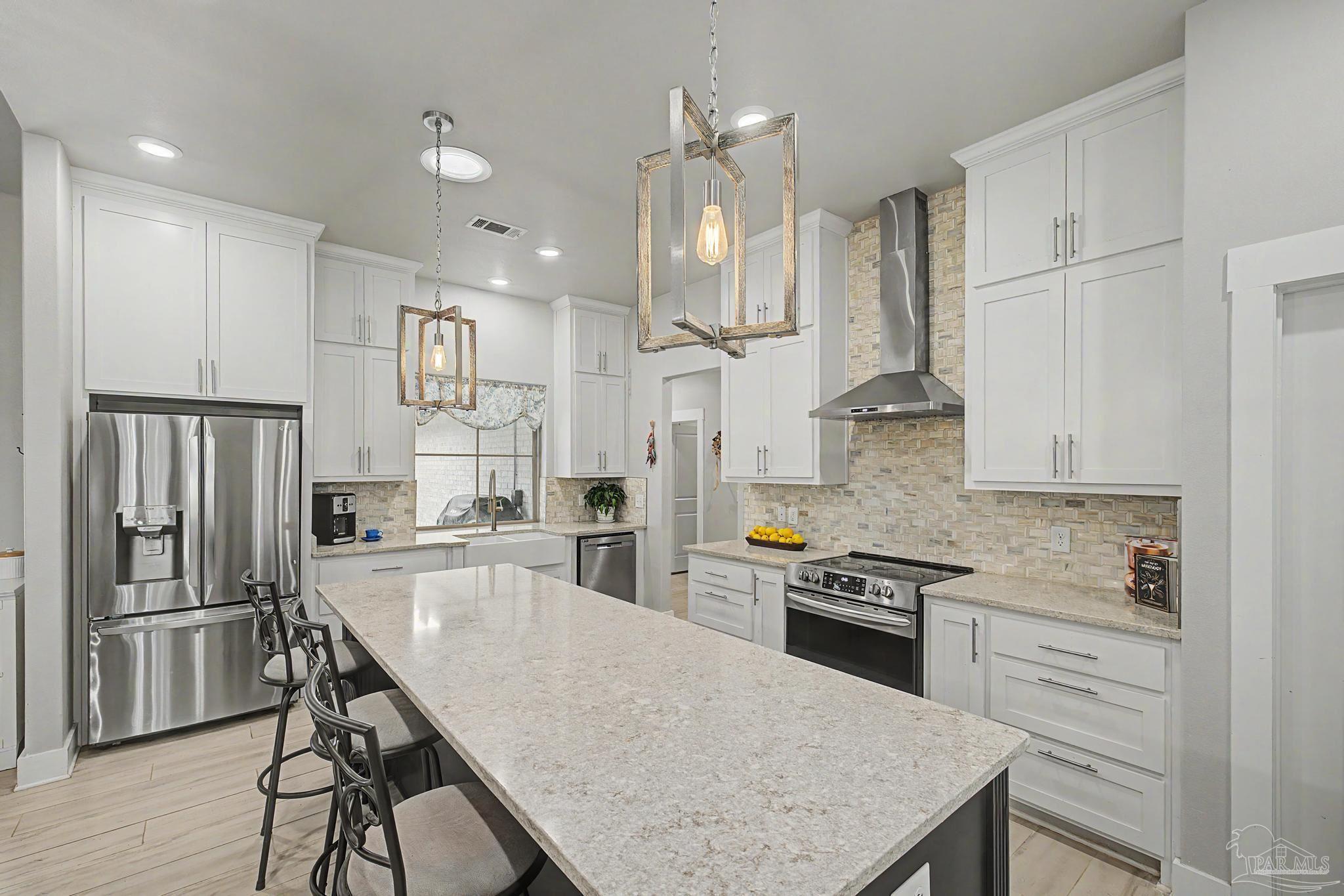 1918 Pineview Church Road Jay, FL 32565 - Photo 7 of 45 a kitchen with granite countertop a counter space stainless steel appliances and cabinets
