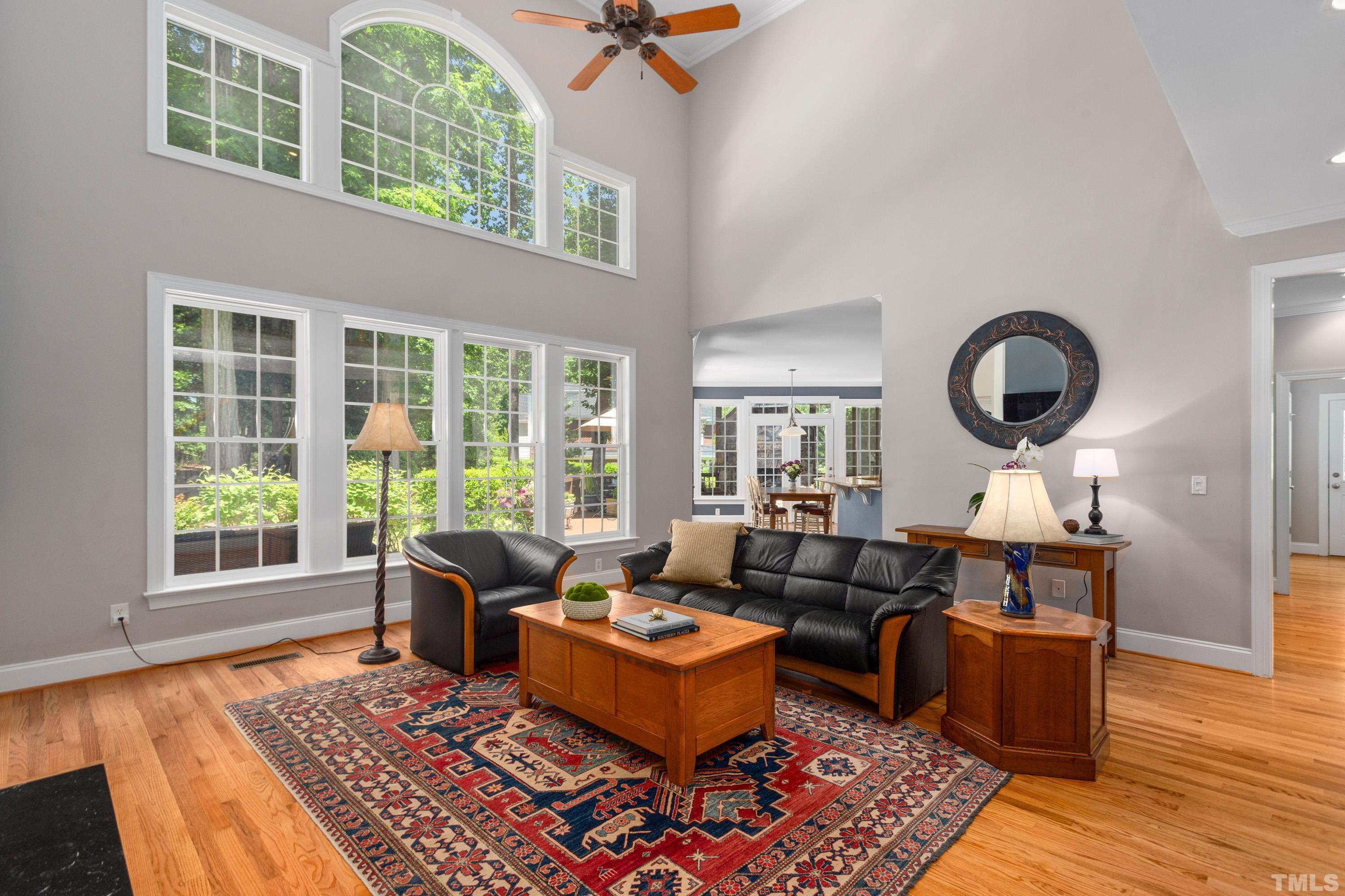 3728 Grandbridge Drive Apex, NC 27539 - Photo 13 of 76 a living room with furniture and a large window