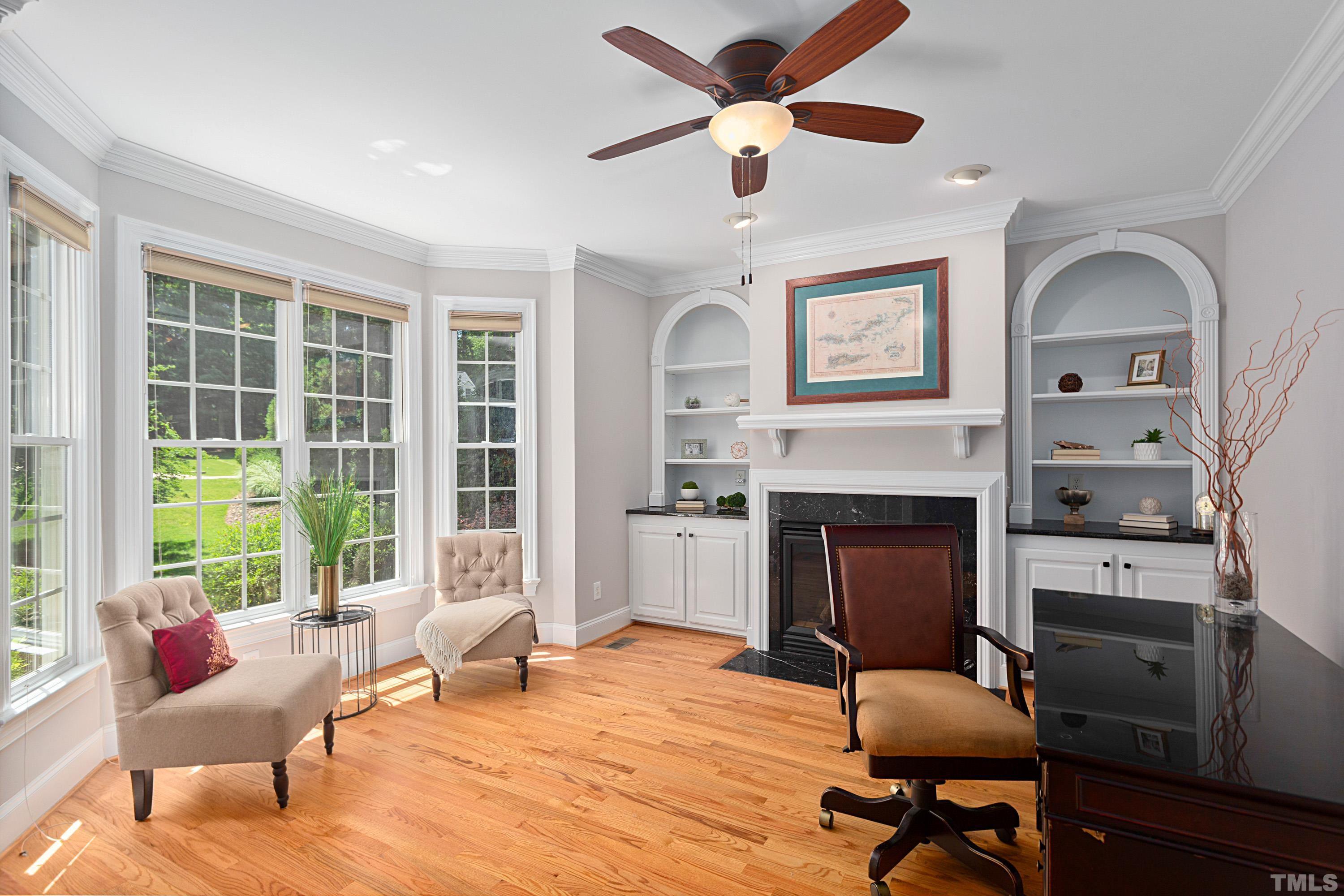 3728 Grandbridge Drive Apex, NC 27539 - Photo 15 of 76 a workspace with wooden floor and a window