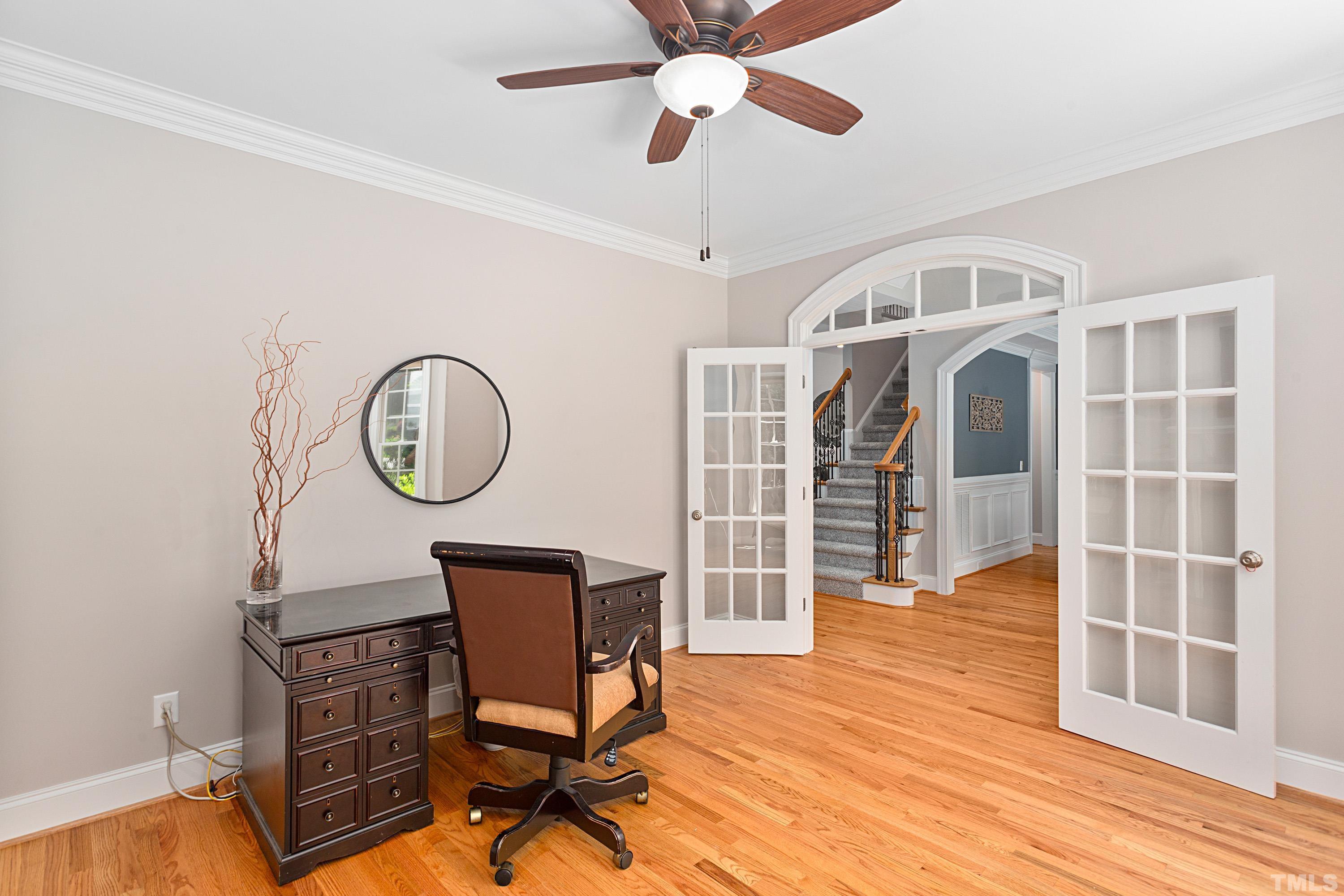 3728 Grandbridge Drive Apex, NC 27539 - Photo 16 of 76 a view of a livingroom with furniture and wooden floor