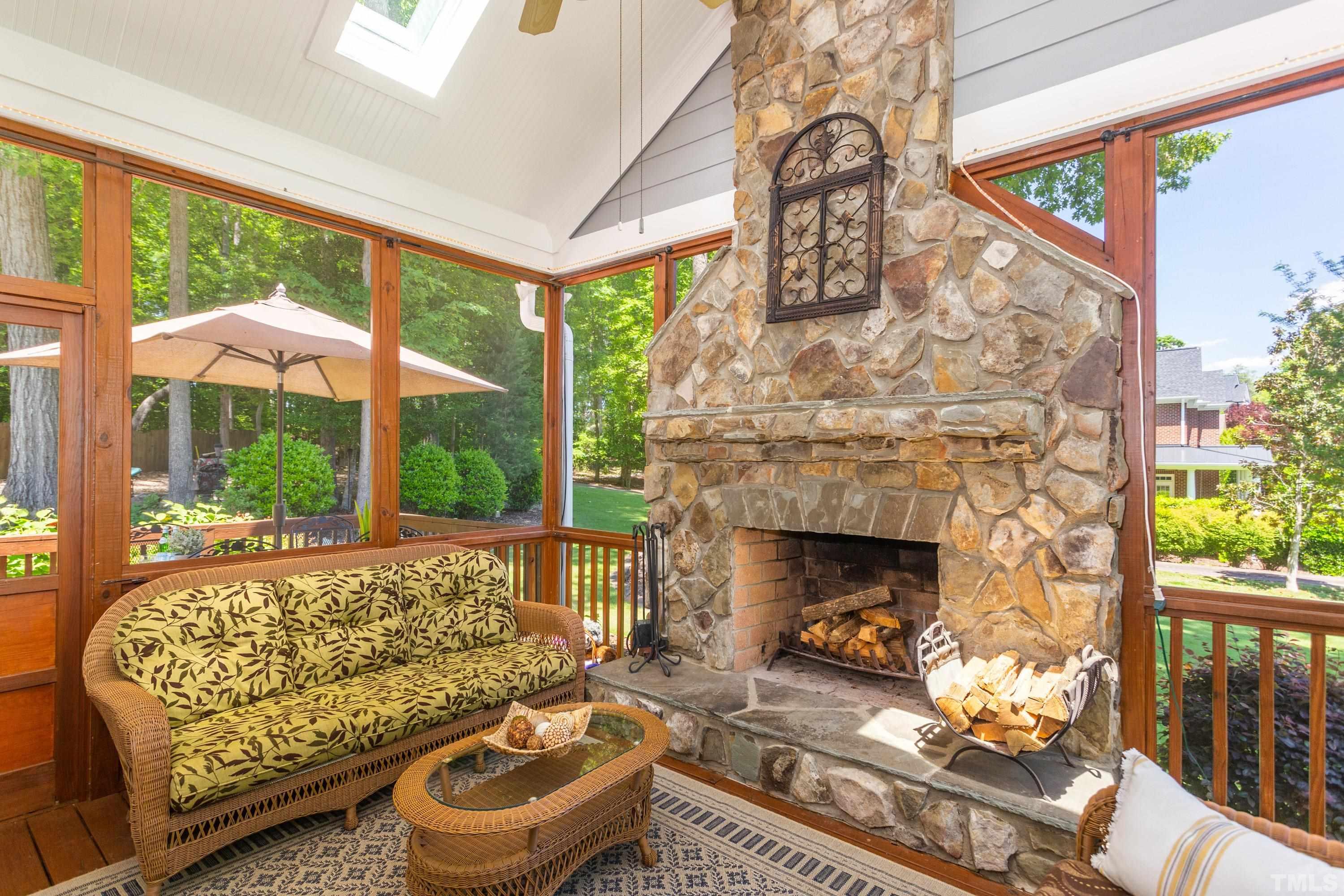 3728 Grandbridge Drive Apex, NC 27539 - Photo 22 of 76 a living room with furniture and a fireplace