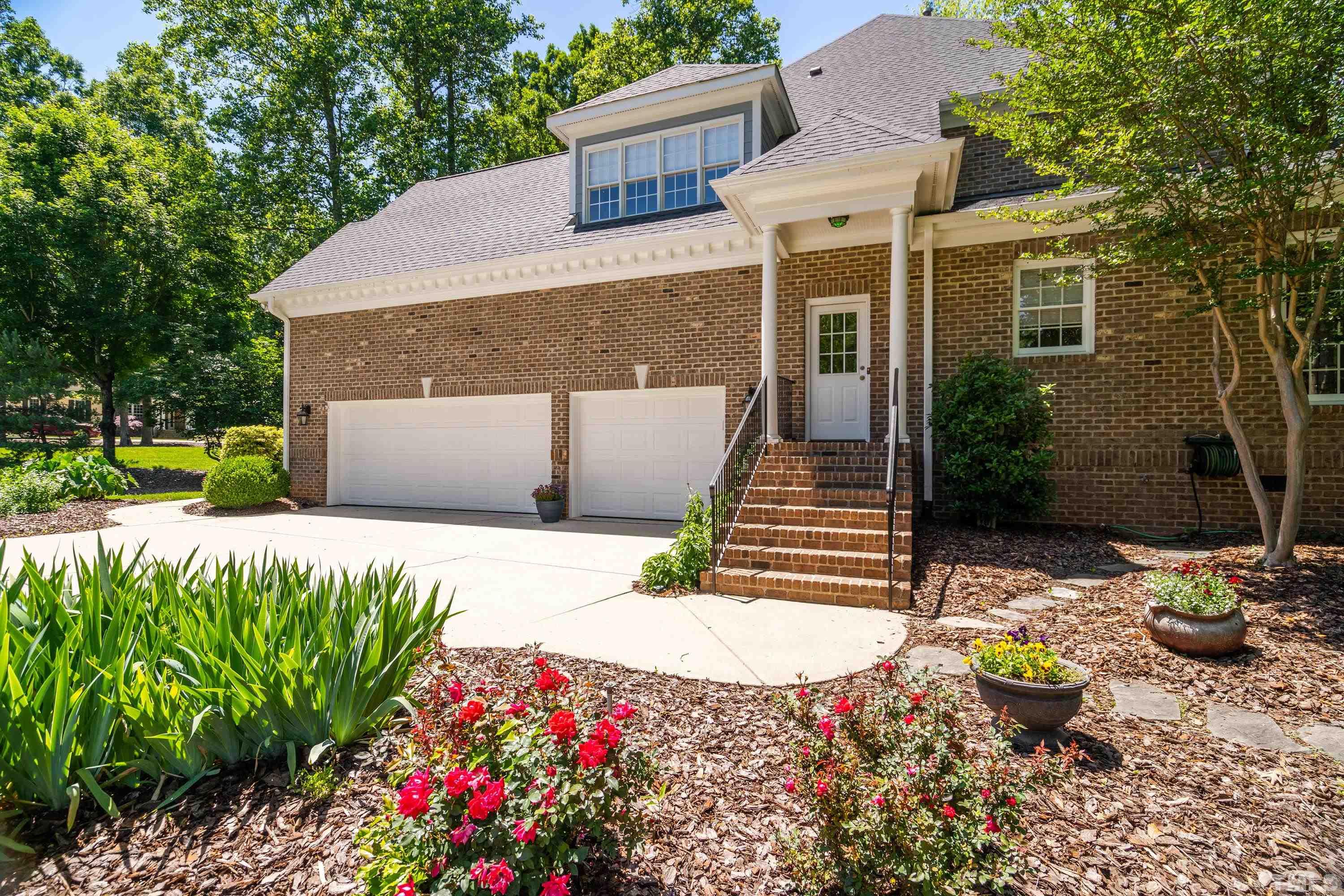 3728 Grandbridge Drive Apex, NC 27539 - Photo 4 of 76 a front view of a house with a yard